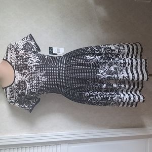 Gabby Skye Size 4, White and Black cutout dress